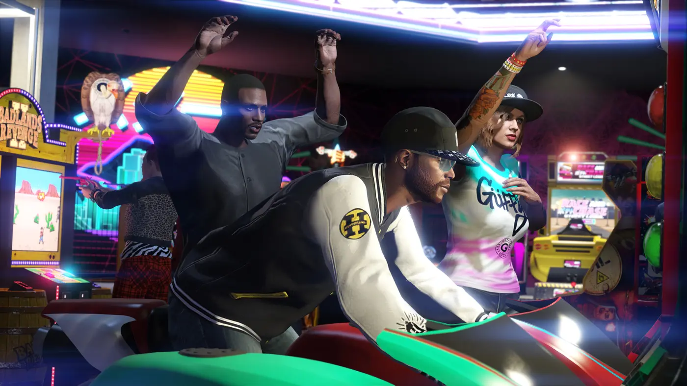 Interior of a GTA Online arcade lit by colorful neon, characters playing on a racing cabinet, retro machines all around