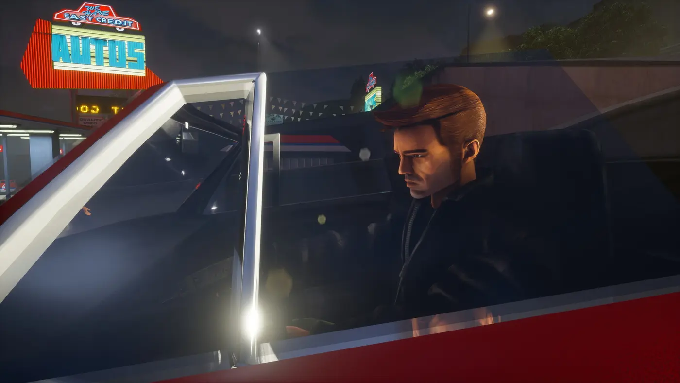 Claude, the protagonist of GTA 3, driving a red convertible at night in front of a neon-lit car dealership, in Liberty City