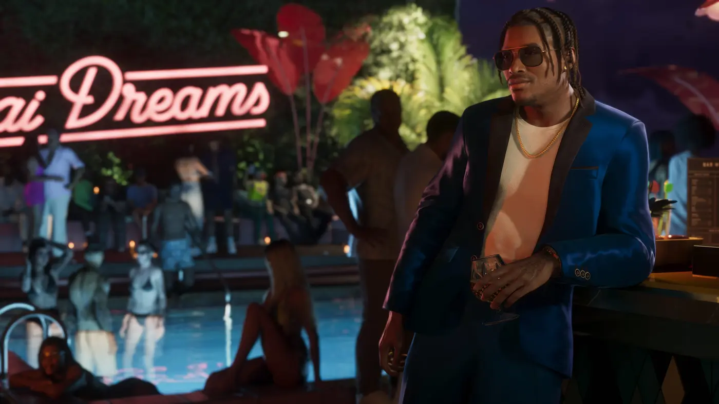 Dre'Quan Priest in a blue suit, drink in hand, at a poolside party lit by a neon sign at night, a crowd of partygoers around the pool in Vice City