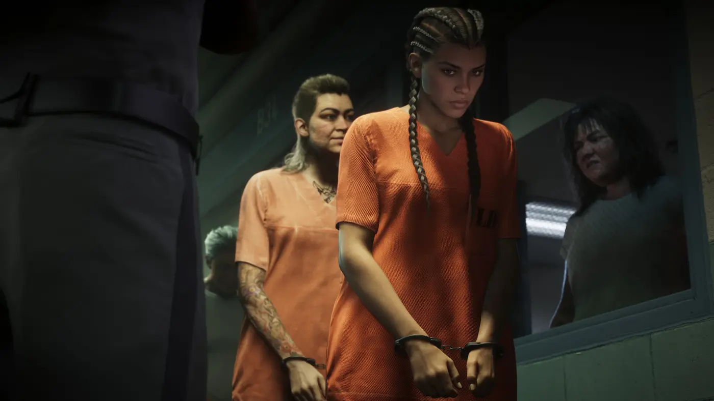 Lucia Caminos in handcuffs, wearing an orange inmate jumpsuit, escorted down a Leonida prison hallway with other inmates